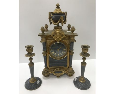 A circa 1900 brass and grey marble cased clock garniture, the eight day movement by Japy Frères of Paris, flanked by two matc