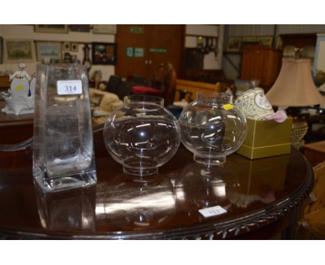 Two glass oil lamp shades, a glass vase and a commemorative mug