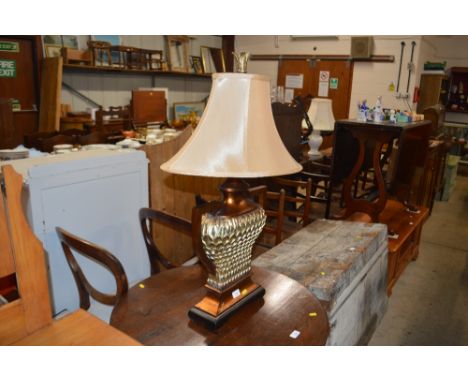 A large modern pineapple style table lamp and shade