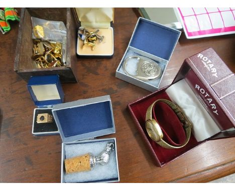 A mixed lot to include  Rotary gents' wristwatch, cufflinks, a silver plated bottle stopper, bottle opener and a 9ct gold rin