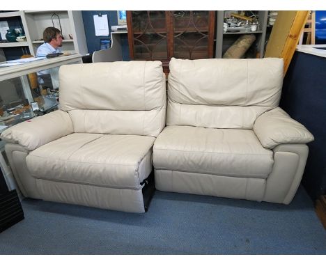 A taupe electrical reclining three seater sofa with another matching armchair in leather