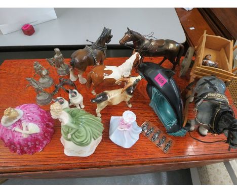 A mixed lot of figures and model animals to include two Royal Doulton figures, a Goebel goat, Poole Dolphin, a Beswick horse 