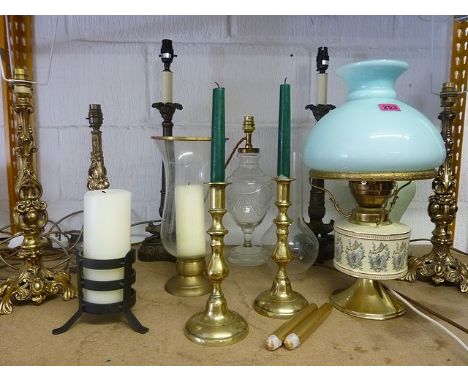 A mixed lot of table lamps to include a cut glass lamp, a green porcelain lamp, a pair of composition lamps, gilt metal lamps