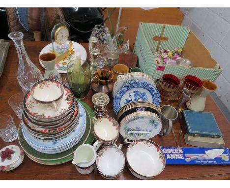 A mixed lot to include ceramics, glassware, china flower ornaments, Wedgwood trinket boxes and silver plated cutlery