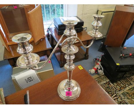 A silver plated on copper candelabra