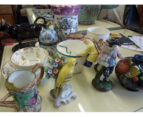 A group of ceramics to include a late 19th century Royal Worcester moustache cup, the handle in the form of a Chinaman, a 19t