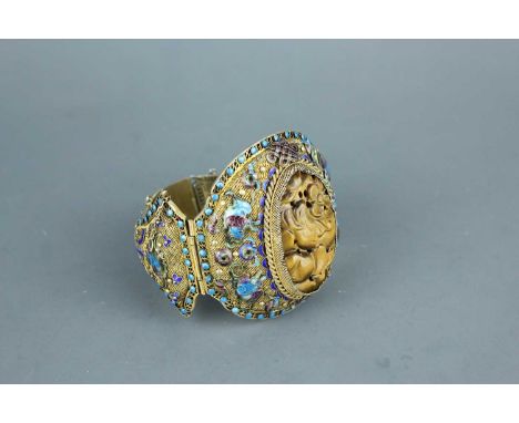 A Chinese Filigree and Enamel Bracelet, early 20th century, finely crafted with intricate wirework and delicate enamel decora