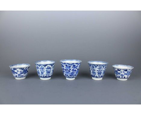 A group of five Chinese blue and white porcelain cups, Qing Dynasty, Kangxi period (1662–1722)  Comprising three bell-shaped 