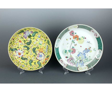 Two Chinese famille rose ‘floral’ dishes, early 20th century. One brightly decorated with scrolling blooms over a yellow grou