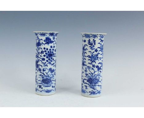 A pair of Chinese blue and white sleeve vases, Qing dynasty, late 19th century, each decorated with flower sprays and birds t