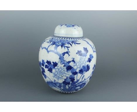 A Chinese blue and white ovoid jar with cover, Qing Dynasty late 19th century, finely painted with two birds standing on the 