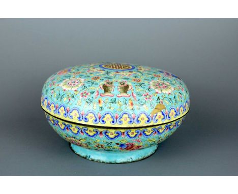 A large Chinese Canton enamel “Eight Buddhist Emblems” covered box, Qing Dynasty, 19th Century.  The domed cover is brightly 