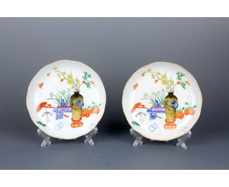 A pair of Chinese famille rose dishes, QING Dynasty, Xianfeng Mark and of the period (1851-1861), each with a gilded shallow 