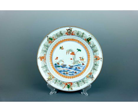 A Chinese famille verte dish, Qing Dynasty, Kangxi period (1662-1722), decorated in cobalt blue, polychrome enamels and gilt 