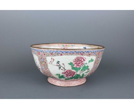 A large Chinese Canton enamel “birds and flowers” bowl, Qing Dynasty, 19th Century.  Brightly painted with four panels of bir