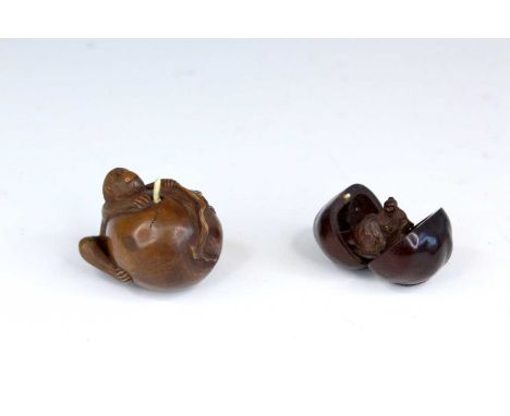 Two Japanese wood netsuke, late Edo/Meiji, 19th century. The first carved as a monkey holding a peach, with a worm sticking o