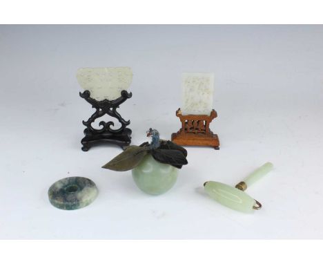 A group of five Chinese jade objects, 19th to 20th century, comprising two white and pale celadon jade reticulated plaques, o