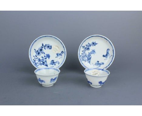 Two sets of Chinese blue and white cups and saucers, Qing Dynasty, Kangxi period (1662–1722). Each piece is decorated with tw