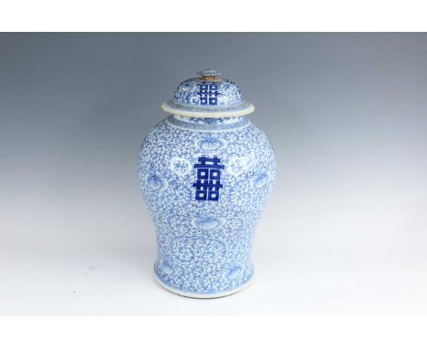 A large Chinese blue and white covered jar, Qing Dynasty, 19th century, decorated with scrolling lotus and ‘Double Happiness’