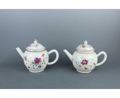 A pair of Chinese famille rose teapots, Qing Dynasty, 18th century. Each of globular form, decorated with a floral design fea