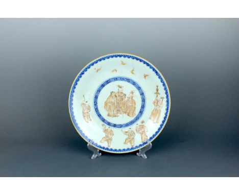 A Chinese underglaze blue and iron-red decorated ‘figural’ dish, Qing Dynasty, Qianlong mark and probably of the period (1736