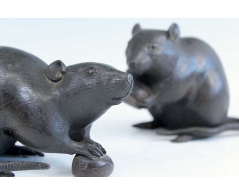 Japanese bronze okimono of two rodents, Meiji era (1868-1912), each holding a chestnut with pinched ears and a coiled tail, t