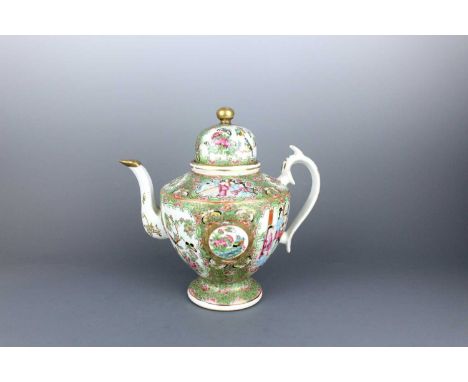 A large Chinese Canton famille rose teapot and cover, Qing Dynasty, 19th Century. Decorated with panels of figures and birds-