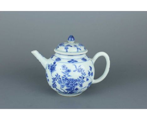 A Chinese blue and white teapot, Qing Dynasty, Kangxi period (1662–1722)  Brightly decorated with flowering shrubs and floral