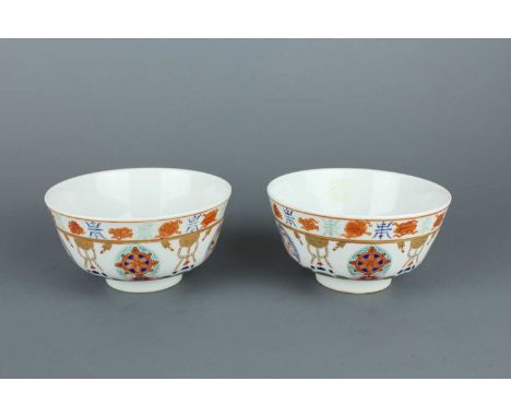 A pair of Chinese famille rose ‘Baragon Tumed’ bowls, Qing Dynasty, 19th or later. Painted to the exterior with five of the S