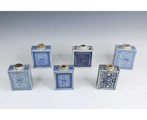 Six Chinese blue and white tea caddies, Qing Dynasty, late 19th century. Each of rectangular form and decorated with a variet
