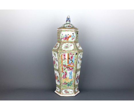 A large Chinese Canton famille rose hexagonal vase and cover, Qing Dynasty, mid-19th century  Finely painted on the main pane