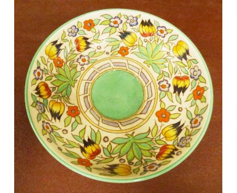 A large Charlotte Rhead Bursley Ware Art Deco tube lined tulip pattern TL14 charger, C1935. measures 29 cm across and 8 cm hi