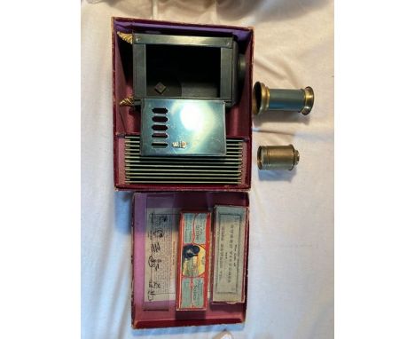 C C &amp; Co magic lantern with additional slides in two boxes plus loose slides. over 25 slides in total.