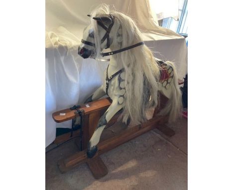 Dapple grey Rocking horse in working order, early to mid 20th century quality item with real mane and tail, leather tack and 