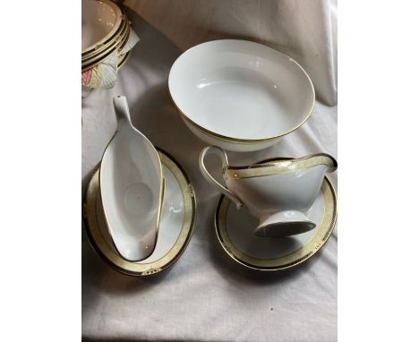 Spode Avignon Dinner Service including:1 meat platter 10 assorted serving bowls2 sauce boats with saucers10 dinner plates10 s