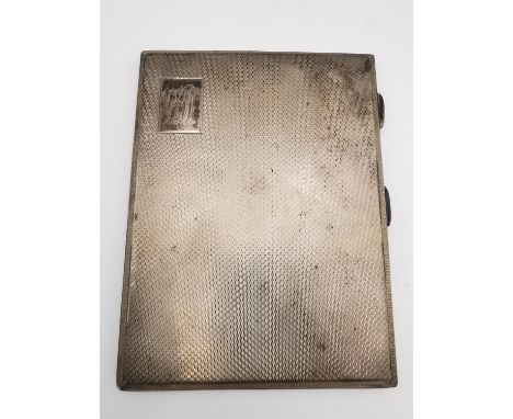 A 1940s silver cigarette case by Morgan &amp; Boon with engine turned decoration and gilded interior. Inscribed to the inside