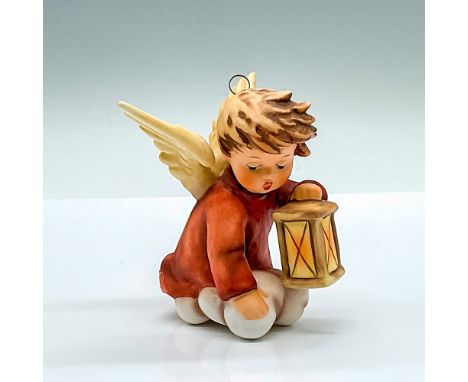 Hand painted angel holding a lantern. Goebel Hummel marking. Issued: 1991Dimensions: 3"L x 3"W x 3.5"HManufacturer: Goebel Hu