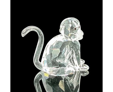 This zodiac monkey figurine is a captivating piece from the Chinese Zodiacs Collection. Crafted from clear crystal, it featur