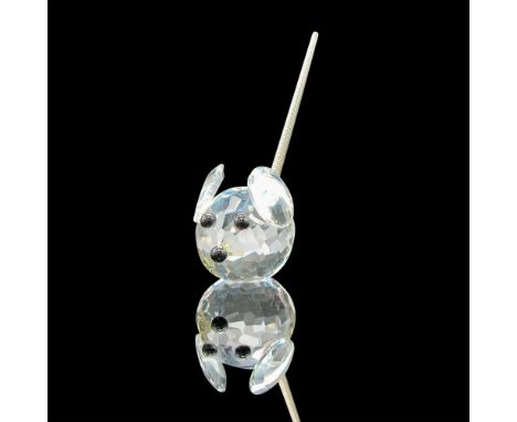 Made from clear crystal, with black eyes and nose, the mini mouse has a metal spring coil tail and no base. Part of the Mini 