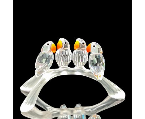 This set of 4 baby lovebirds sitting on a branch were part of the Feathered Beauties theme. The four faceted clear crystal Lo