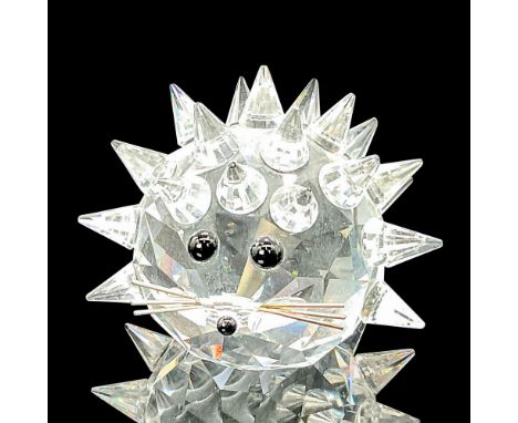 This hedgehog in clear faceted crystal replicates real hedgehogs that roll into a ball in defense, leaving a ball of spines. 