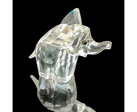 Designed for the Rare Encounters theme group, the Small Elephant figurine showcases a clear faceted crystal body, accentuated