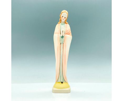 Tall slender Madonna figure, featuring a standing Madonna praying in pastel tones. Figure #46/0 TMK8. Goebel backstamp. Issue