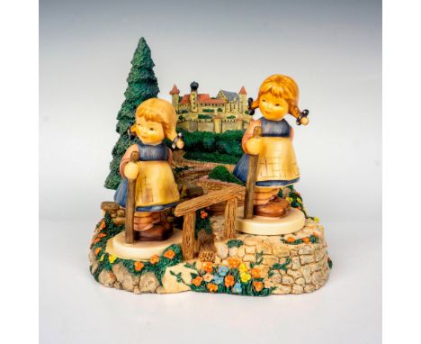 Hand painted in matte finish figurines designed to be displayed on base titled Castle on The Hill. Hummel M. I. Hummel impres