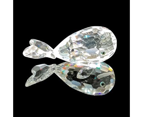 This cheerful crystal whale is made from clear crystal and has green/black eyes and a frosted mouth. This item has its origin