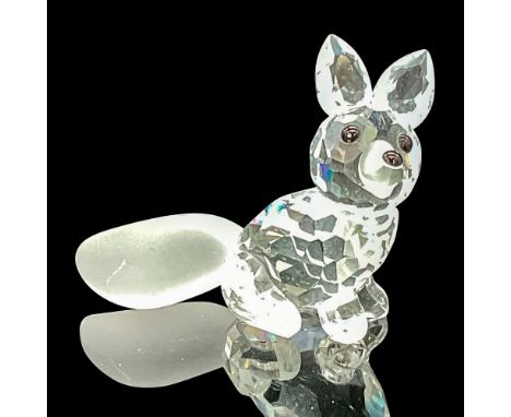 This fox figure showcases a clear faceted head and body, enhanced by a black nose and eyes, capturing the essence of this ele