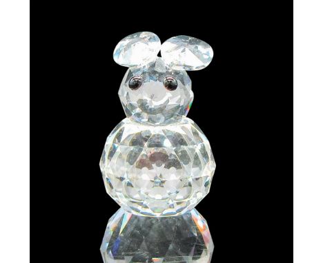 Clear, faceted body, head and tail with ears back. Black button eyes. Swarovski SCS backstamp. 7652 020 000. This item has it
