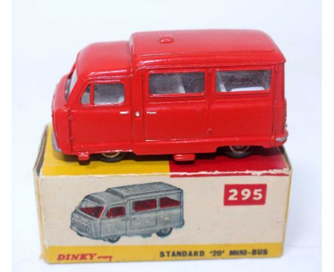 A Nicky Toys of Calcutta model of a No. 295 Standard 20 Minibus, finished in red with white interior and silver hubs, housed 