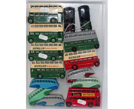 A Dinky Toys collection of various public transport and taxi diecast vehicles and accessories to include an Exide Batteries d