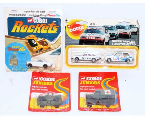 A Corgi Juniors and Corgi Rockets carded diecast group to include No. 76 US Military Jeep, No. 79 Land Rover Military Ambulan